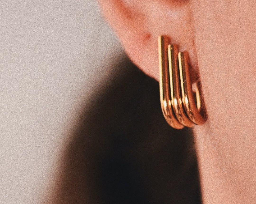 Art Deco Small Stud Earrings on ears