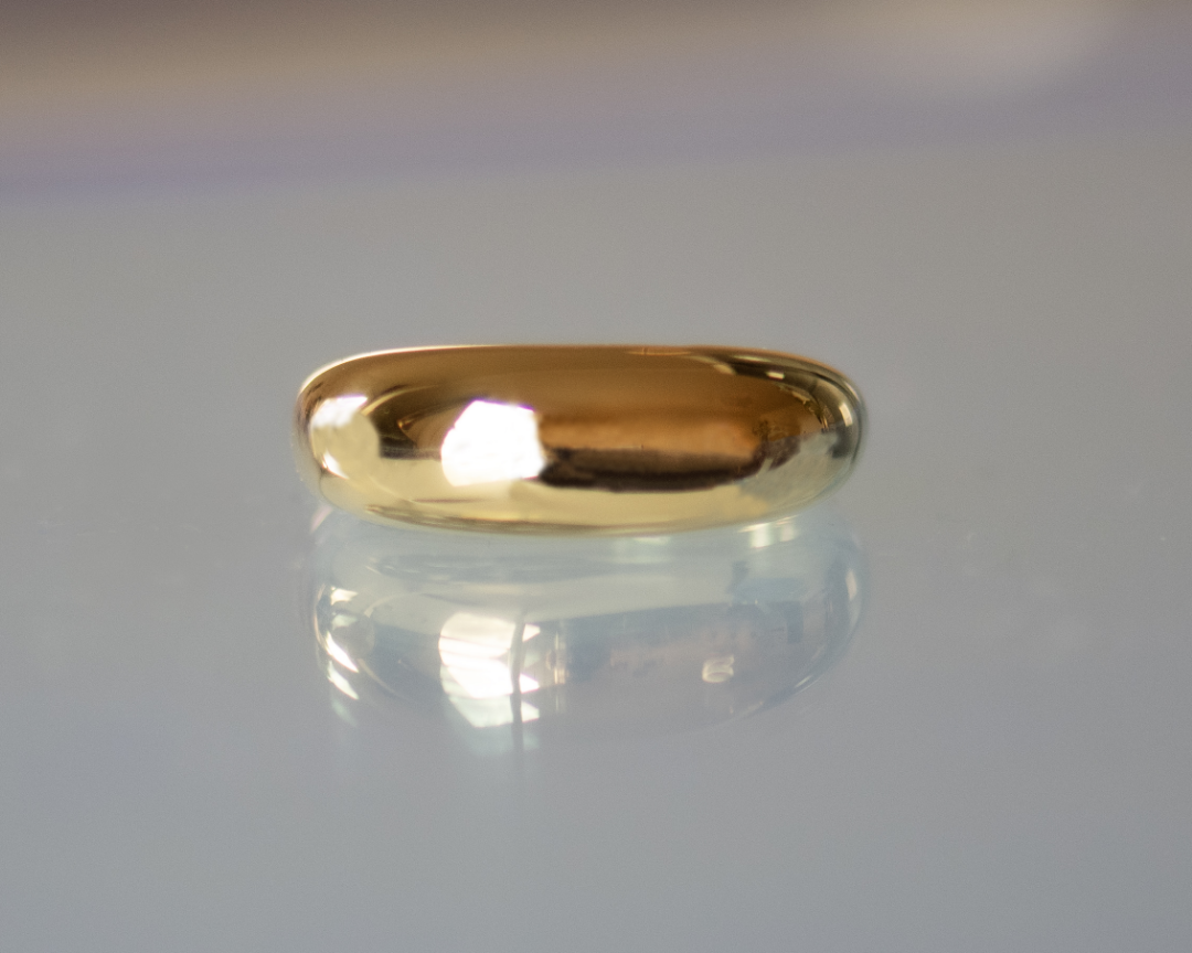 Sonia Gold Ring blurred background