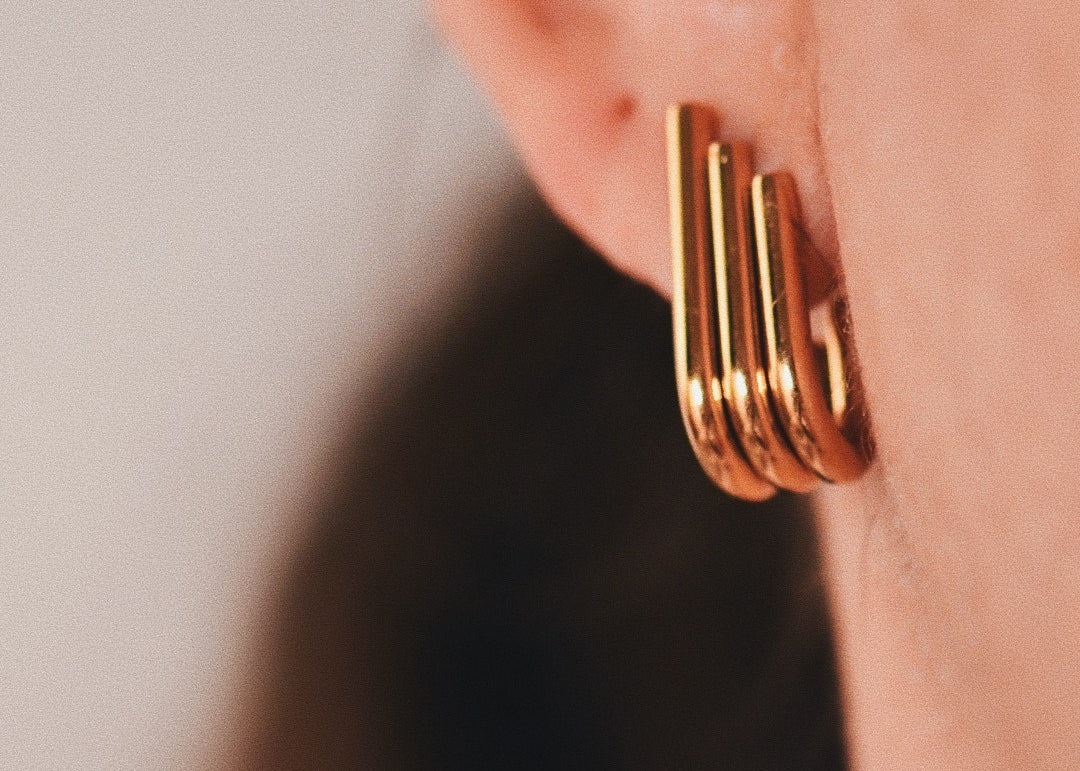 Art Deco Small Stud Earrings on ears