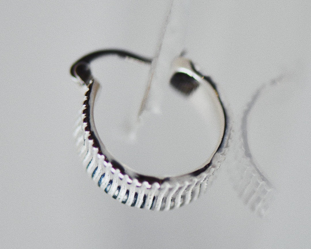 Close-up of the Moonlit Frost Hoop Silver Earrings