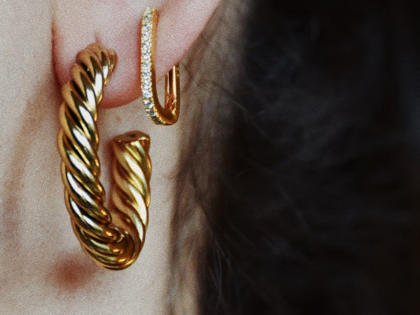woman wearing the Vivienne Gold Hoop Earrings, layered, stylish, gold plated, waterproof, non-tarnishing