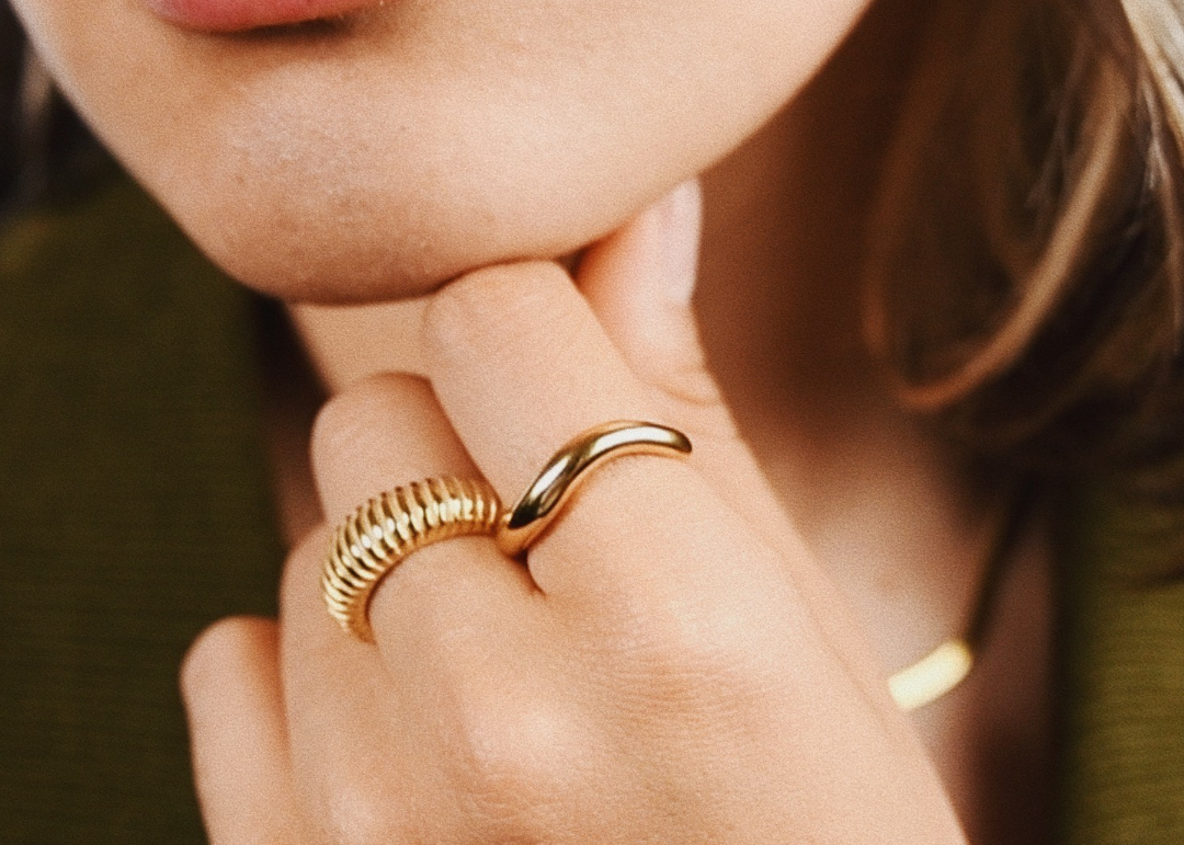 Woman wearing Maris Ring and gilded ring
