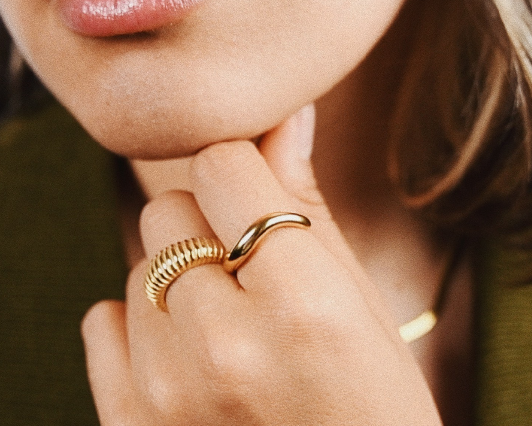 Woman wearing Maris Ring and gilded ring