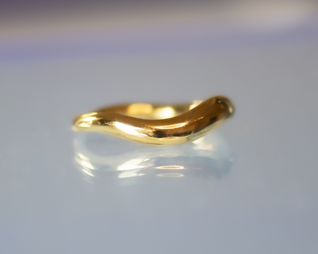 Maris Gold Ring blurred background