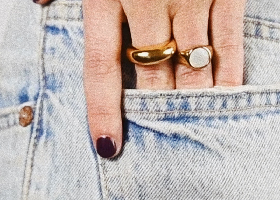 Hands in pocket, wearing Kyle Gold Ring  and Sonia Gold Ring